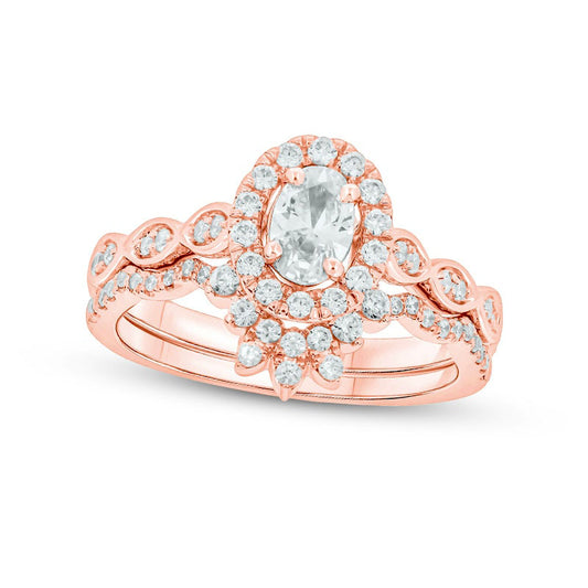1.0 CT. T.W. Oval Natural Diamond Frame Bridal Engagement Ring Set in Solid 14K Rose Gold (I/I2)