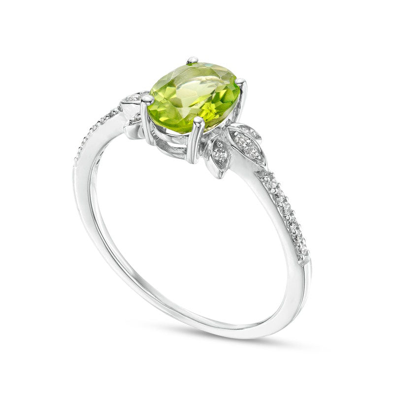 Oval Peridot and 0.10 CT. T.W. Natural Diamond Leaf-Sides Floral Ring in Solid 10K White Gold