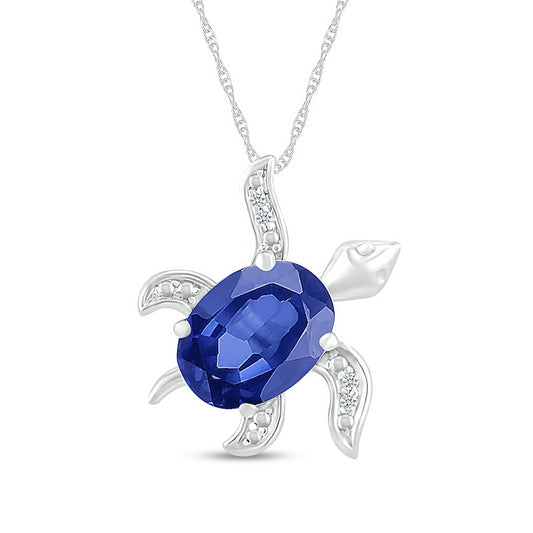 Oval Blue Lab-Created Sapphire and Diamond Accent Beaded Tilted Sea Turtle Pendant in Sterling Silver