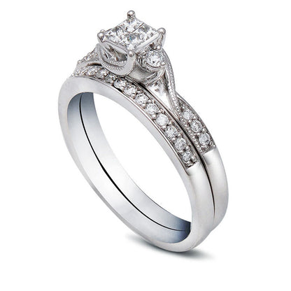 Previously Owned - 0.33 CT. T.W. Princess-Cut Quad Natural Diamond Bridal Engagement Ring Set in Solid 10K White Gold