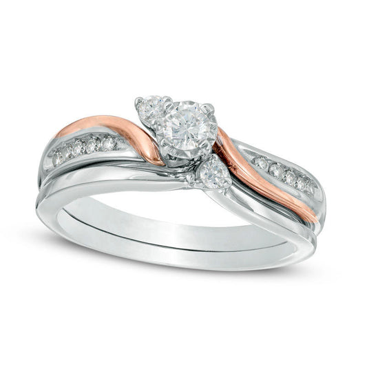 Previously Owned - 0.33 CT. T.W. Natural Diamond Three Stone Slant Bridal Engagement Ring Set in Solid 10K Two-Tone Gold