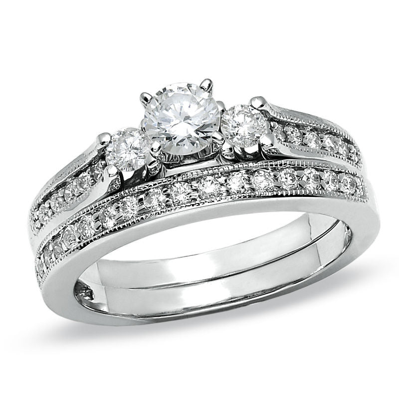 3/4 CT. T.W. Diamond Three Stone Bridal Engagement Ring Set in 14K White Gold