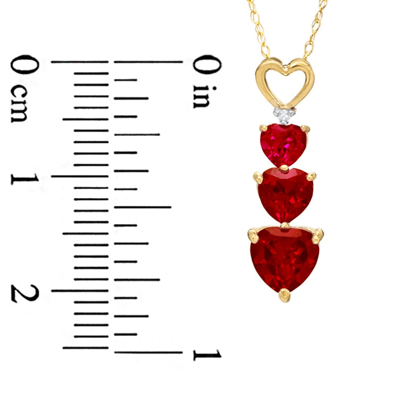 Heart-Shaped Lab-Created Ruby and Diamond Accent Three Heart Pendant in 10K Yellow Gold