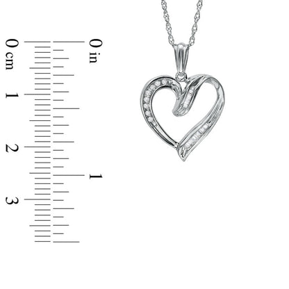 0.07 CT. T.W. Baguette and Round Natural Diamond Heart Pendant in Sterling Silver