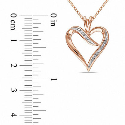 0.05 CT. T.W. Natural Diamond Heart-Shaped Ribbon Pendant in Sterling Silver with Rose Rhodium