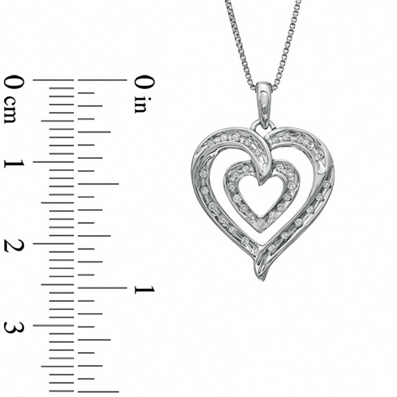 0.13 CT. T.W. Natural Diamond Double Row Heart Pendant in Sterling Silver