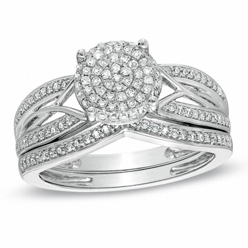 1/3 CT. T.W. Diamond Cluster Intertwined Bridal Engagement Ring Set in 14K White Gold