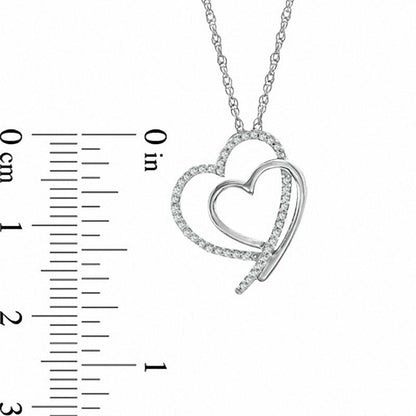 0.13 CT. T.W. Natural Diamond Shadowed Tilted Heart Pendant in Sterling Silver