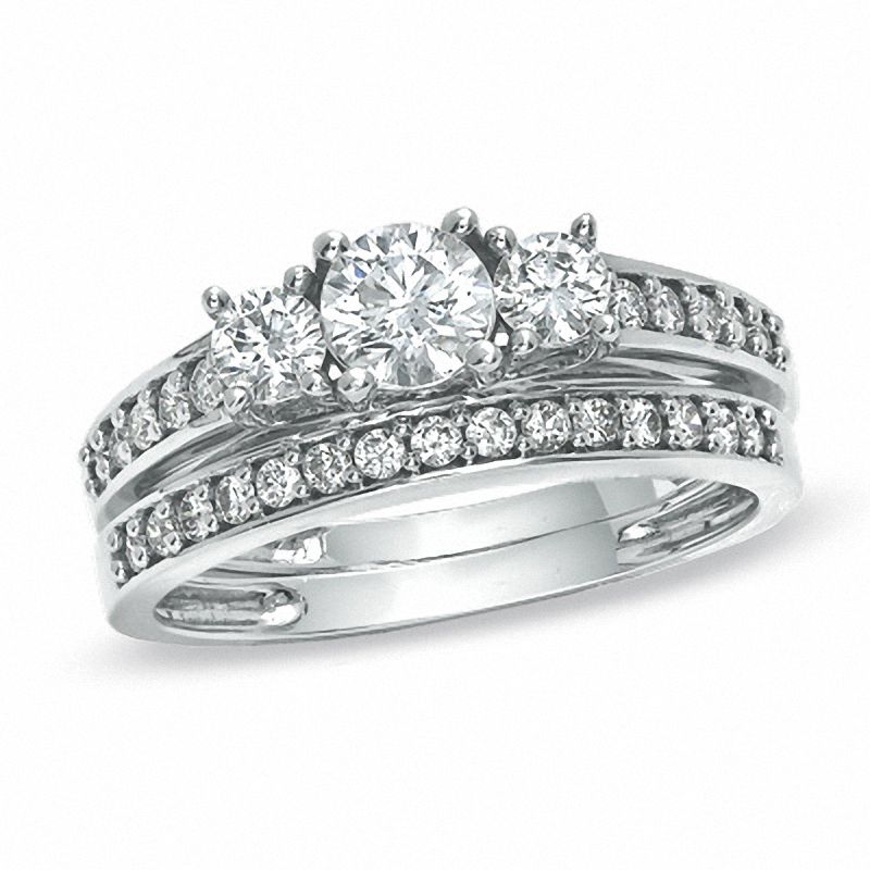7/8 CT. T.W. Diamond Three Stone Bridal Engagement Ring Set in 14K White Gold