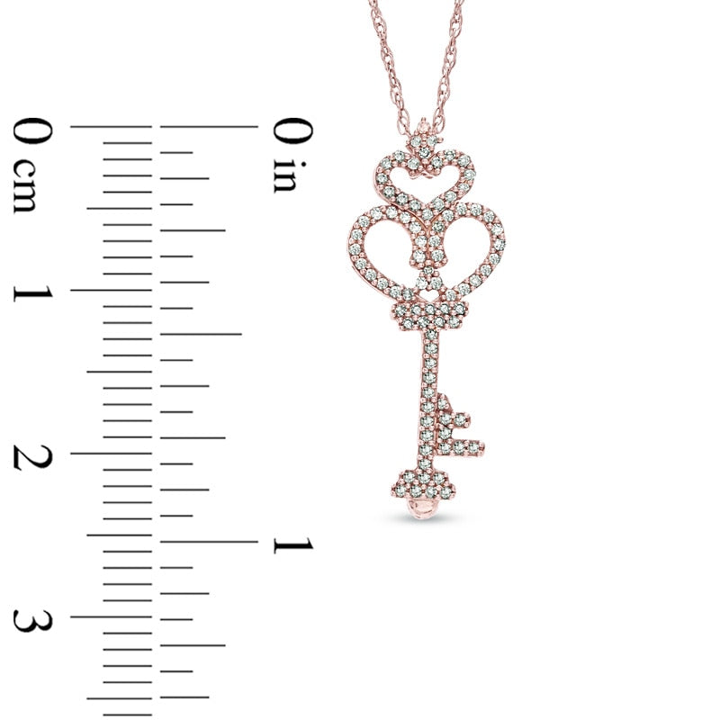 0.17 CT. T.W. Natural Diamond Heart-Top Key Pendant in 10K Rose Gold