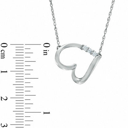 0.13 CT. T.W. Natural Diamond Three Stone Sideways Heart Necklace in Sterling Silver
