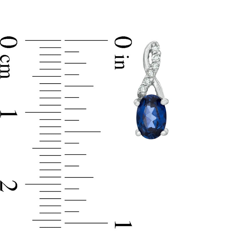 Oval Lab-Created Blue Sapphire and Diamond Accent Twist Earrings in 10K White Gold
