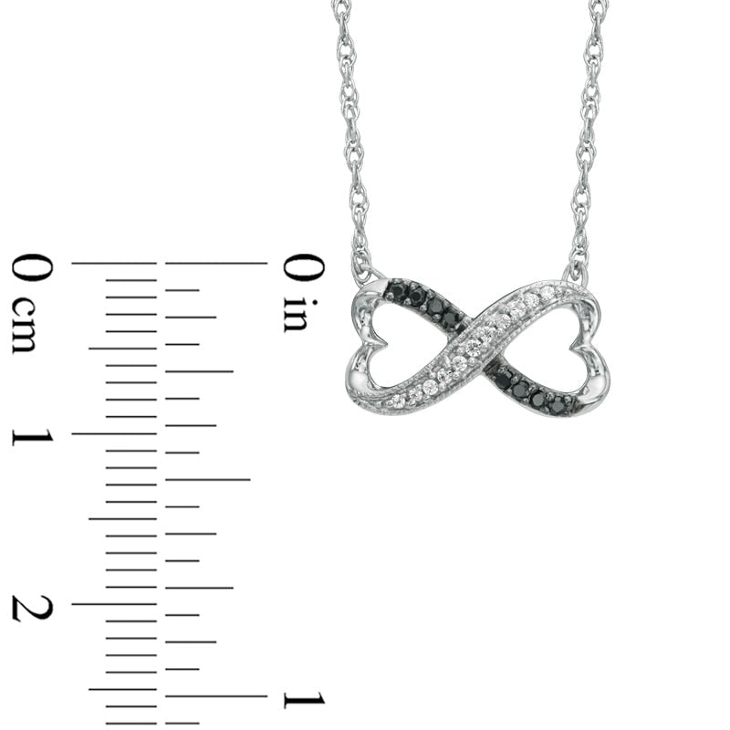 0.1 CT. T.W. Enhanced Black and White Natural Diamond Sideways Heart Infinity Pendant in Sterling Silver