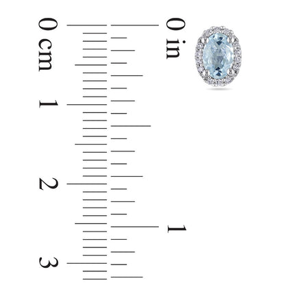 Oval Aquamarine and Diamond Accent Frame Stud Earrings in 10K White Gold