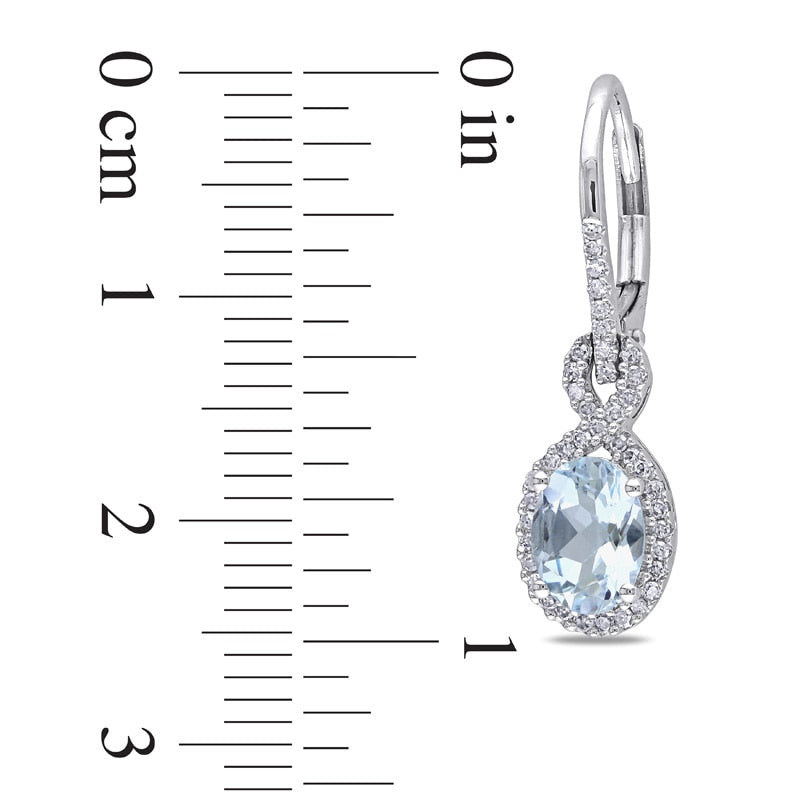 Oval Aquamarine and 0.25 CT. T.W. Diamond Drop Earrings in 10K White Gold