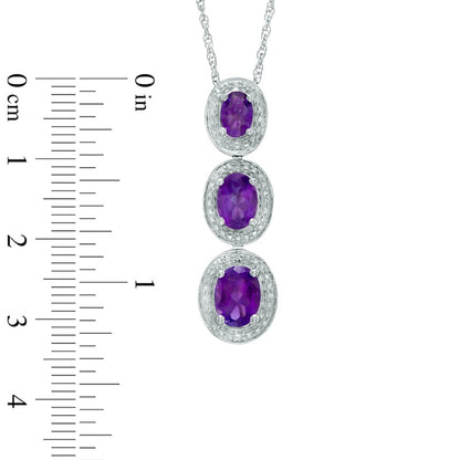 Oval Amethyst and Natural Diamond Accent Frame Three Stone Pendant in Sterling Silver