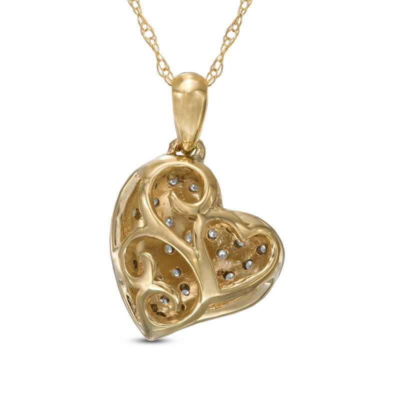 0.13 CT. T.W. Natural Diamond Tilted Puffed Heart Pendant in 10K Yellow Gold