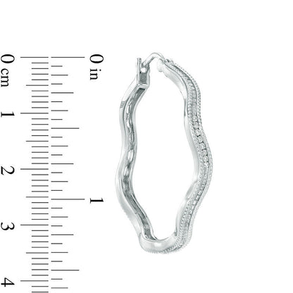 0.1 CT. T.W. Diamond Wavy Hoop Earrings in Sterling Silver