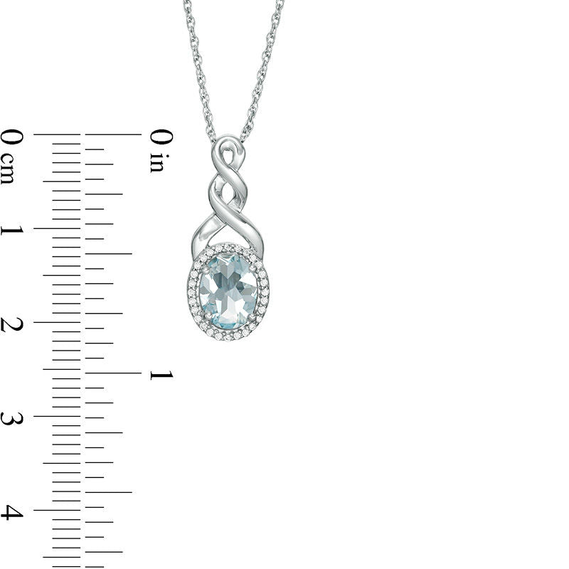 Oval Aquamarine and Natural Diamond Accent Frame Twist Pendant in Sterling Silver