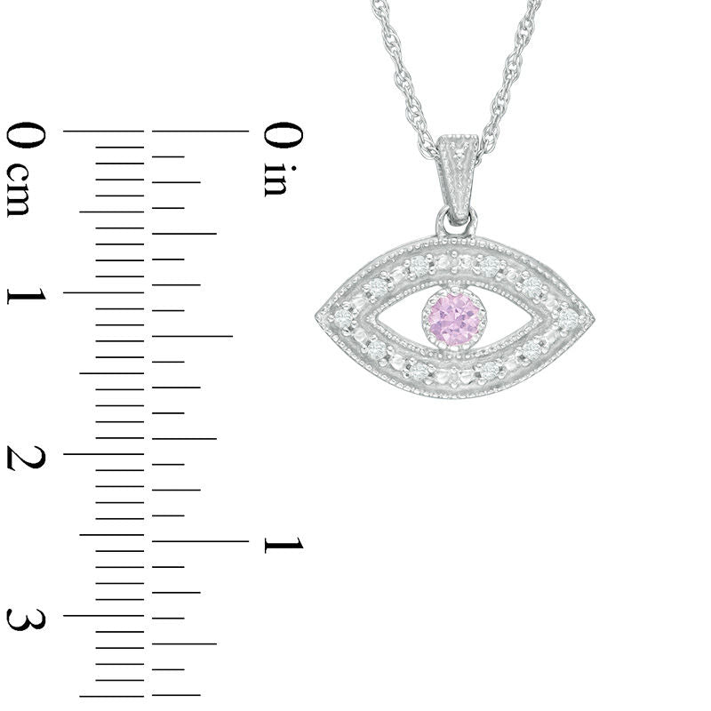 Lab-Created Pink Sapphire and 0.1 CT. T.W. Diamond Evil Eye Pendant in Sterling Silver