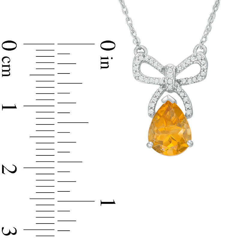 Pear-Shaped Citrine and 0.1 CT. T.W. Natural Diamond Bow Necklace in Sterling Silver
