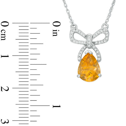 Pear-Shaped Citrine and 0.1 CT. T.W. Natural Diamond Bow Necklace in Sterling Silver