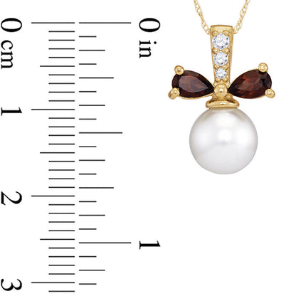 8.0mm Cultured Freshwater Pearl, Pear-Shaped Garnet and Natural Diamond Accent Bow Pendant in 10K Yellow Gold