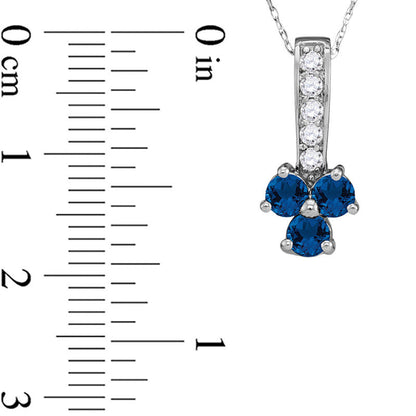 Blue Sapphire and 0.13 CT. T.W. Natural Diamond Trio Pendant in Sterling Silver