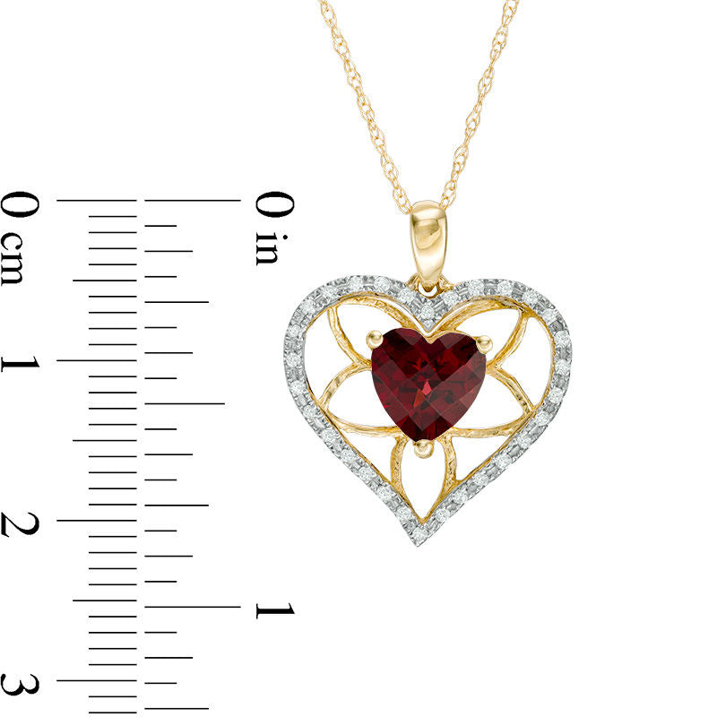 7.0mm Heart-Shaped Garnet and 0.13 CT. T.W. Natural Diamond Floral Heart Pendant in 10K Yellow Gold