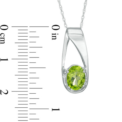Oval Peridot Pendant in 10K White Gold