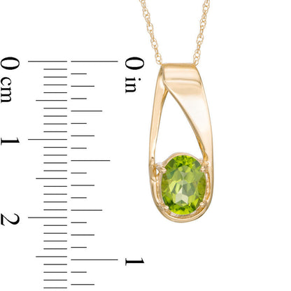Oval Peridot Pendant in 10K Yellow Gold