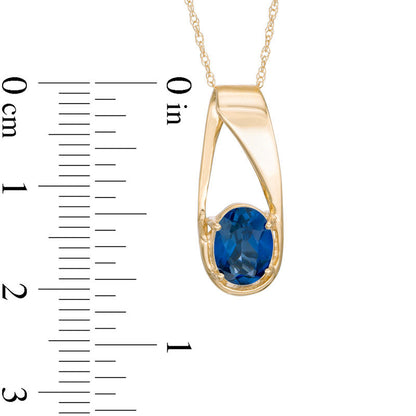 Oval Lab-Created Blue Sapphire Pendant in 10K Yellow Gold