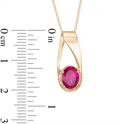 Oval Lab-Created Ruby Pendant in 10K Yellow Gold
