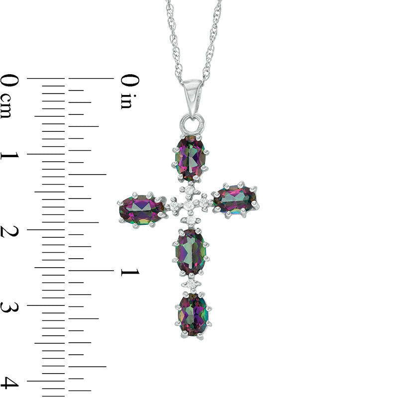Oval Mystic Fire® Topaz and 0.05 CT. T.W. Natural Diamond Cross Pendant in Sterling Silver