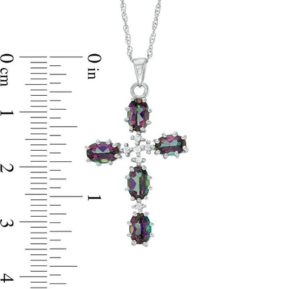 Oval Mystic Fire® Topaz and 0.05 CT. T.W. Natural Diamond Cross Pendant in Sterling Silver