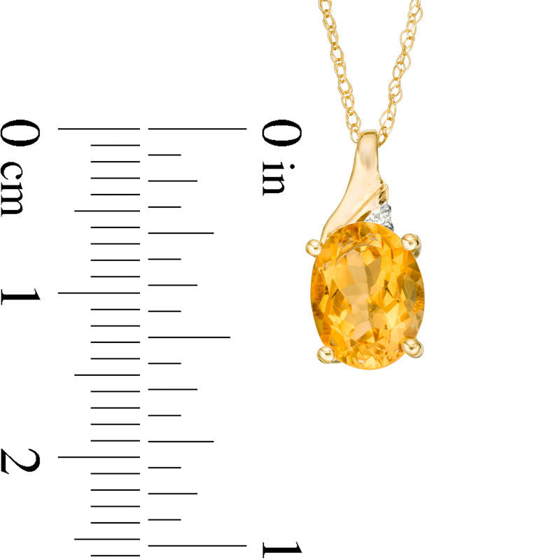 Oval Citrine and Natural Diamond Accent Swirl Top Pendant in 10K Yellow Gold