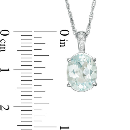 Oval Blue Topaz and Natural Diamond Accent Bale Drop Pendant in Sterling Silver