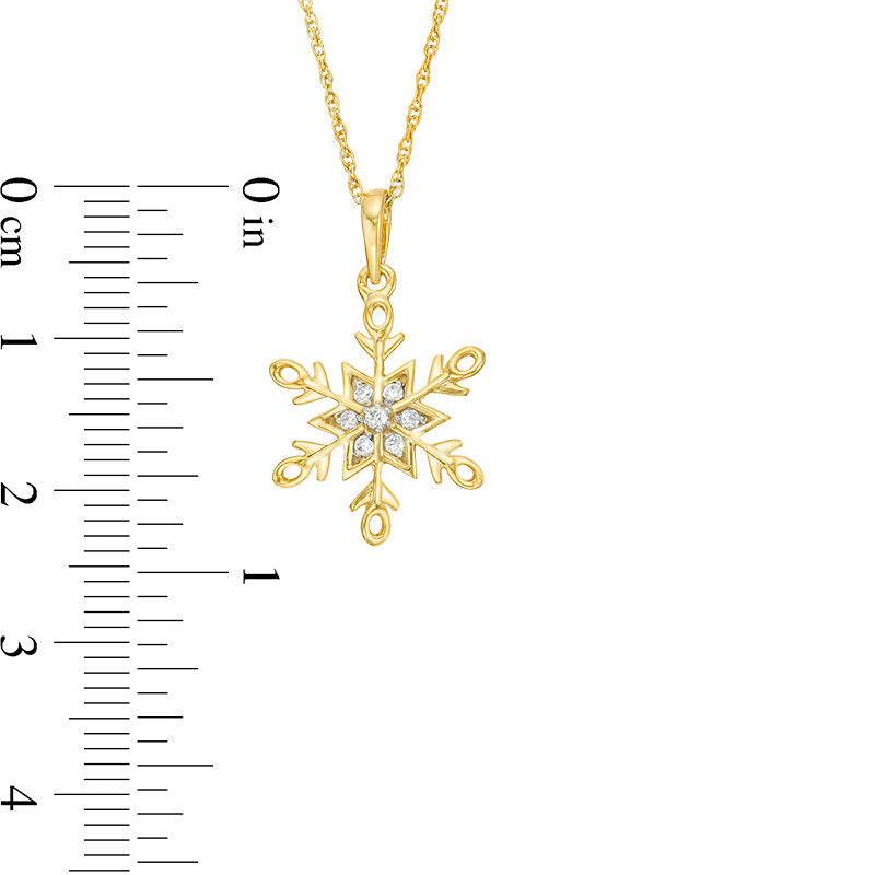 0.07 CT. T.W. Natural Diamond Snowflake Pendant in 10K Yellow Gold