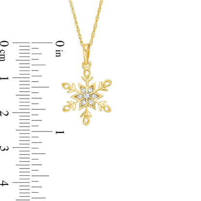 0.07 CT. T.W. Natural Diamond Snowflake Pendant in 10K Yellow Gold