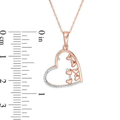 0.1 CT. T.W. Scattered Natural Diamond Tilted Heart Outline Pendant in 10K Rose Gold