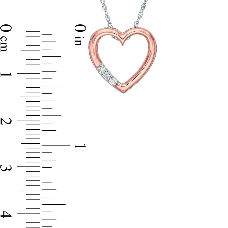 0.1 CT. T.W. Natural Diamond Reversible Heart Outline Pendant in 10K Two-Tone Gold