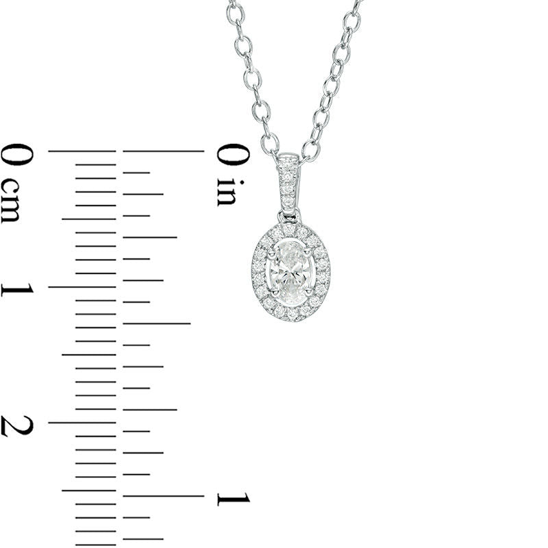 0.25 CT. T.W. Certified Oval Natural Diamond Frame Pendant in 14K White Gold (I/I1)