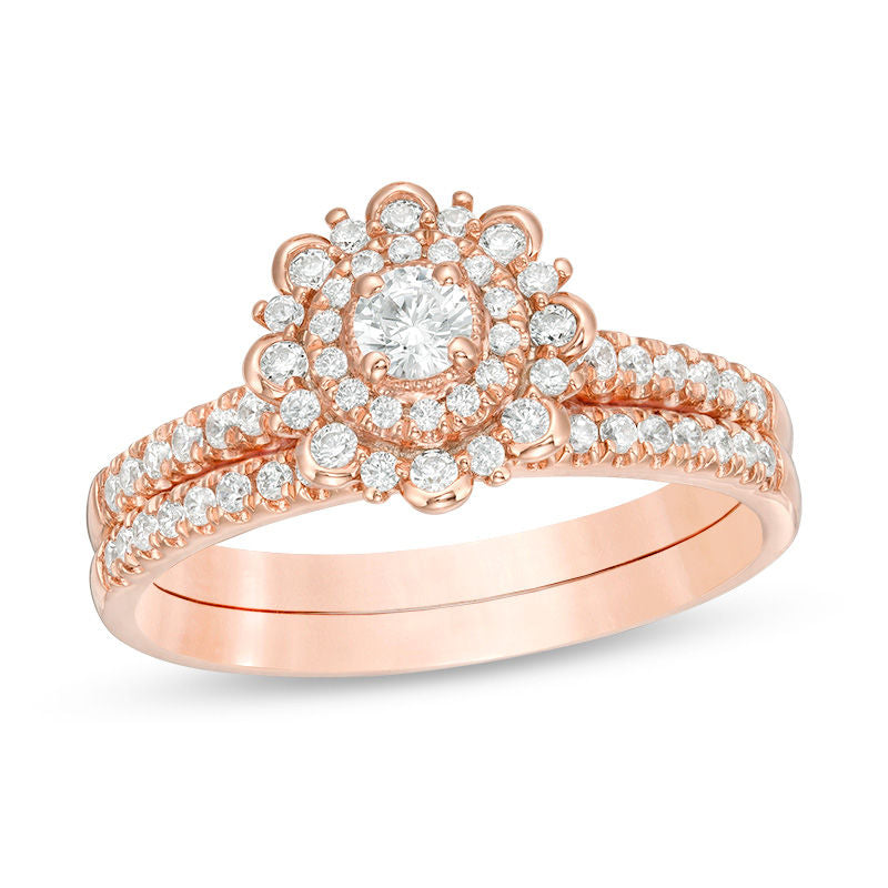 1/2 CT. T.W. Diamond Flower Frame Bridal Engagement Ring Set in 14K Rose Gold