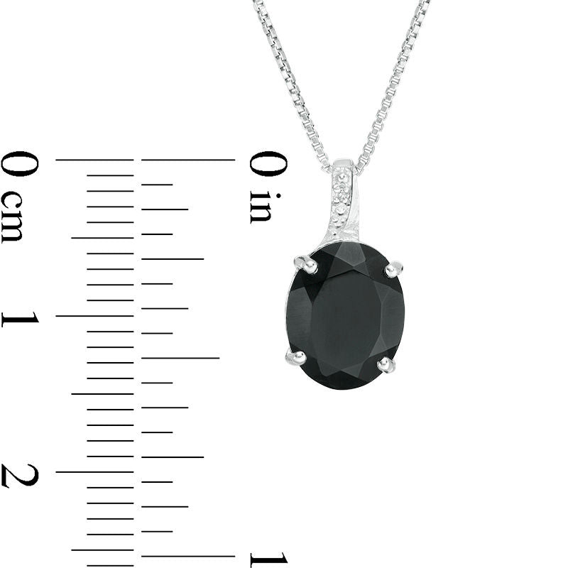 Oval Onyx and Natural Diamond Accent Pendant in Sterling Silver