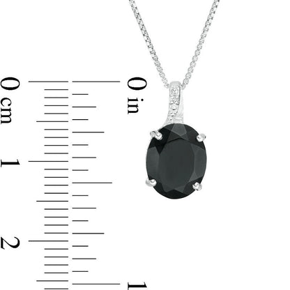 Oval Onyx and Natural Diamond Accent Pendant in Sterling Silver