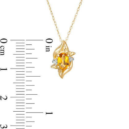Oval Citrine and Natural Diamond Accent Flame Burst Pendant in 10K Yellow Gold
