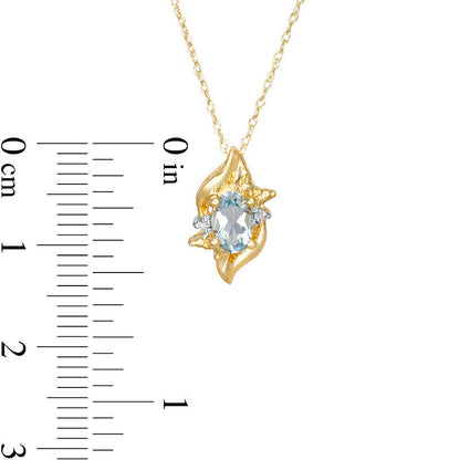 Oval Aquamarine and Natural Diamond Accent Flame Burst Pendant in 10K Yellow Gold