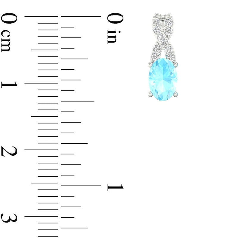 Oval Aquamarine and 0.07 CT. T.W. Diamond "X" Drop Earrings in 10K White Gold