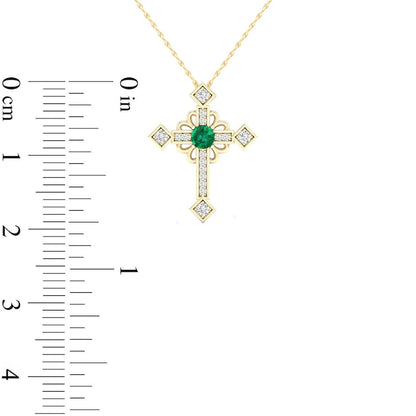 Emerald and 0.05 CT. T.W. Natural Diamond Gothic-Style Cross Pendant in 10K Yellow Gold