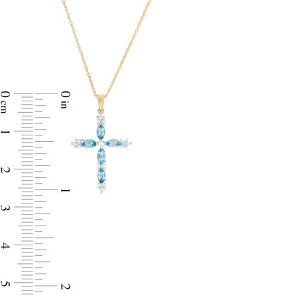 Marquise Swiss Blue Topaz and 0.07 CT. T.W. Natural Diamond Cross Pendant in 10K Yellow Gold